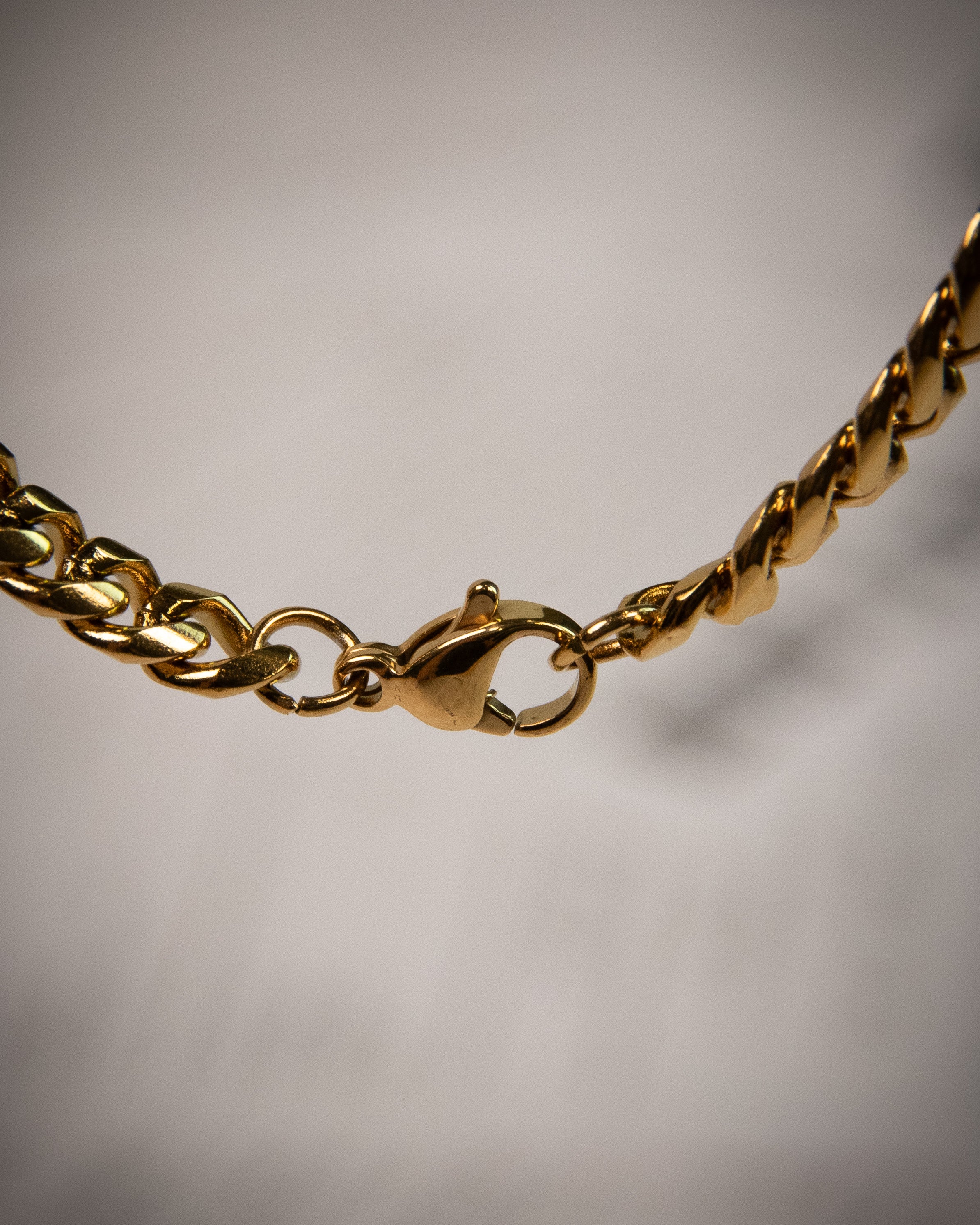 Luxera's Signature Gold-Plated Chains: Elegance Secured with Lobster C